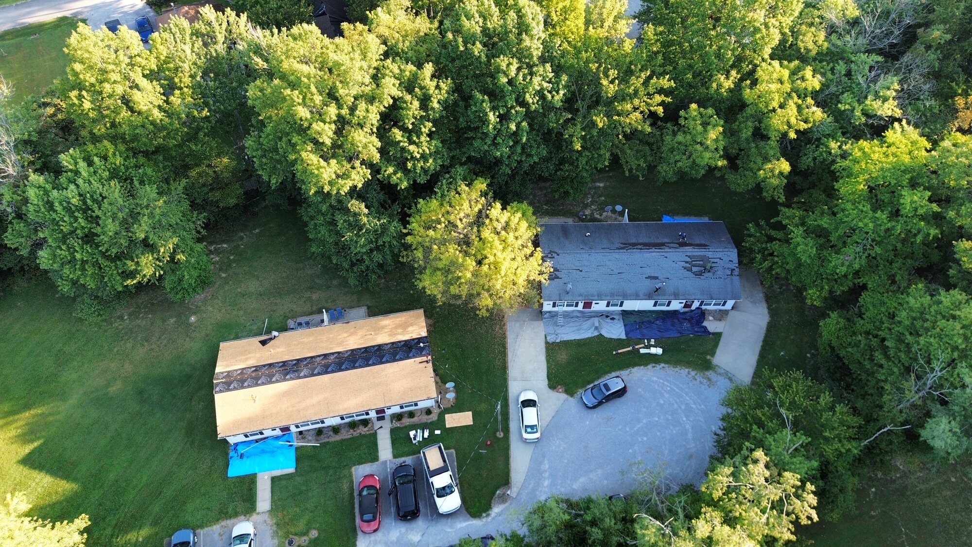 Aerial view along the length of a roof under replacement
